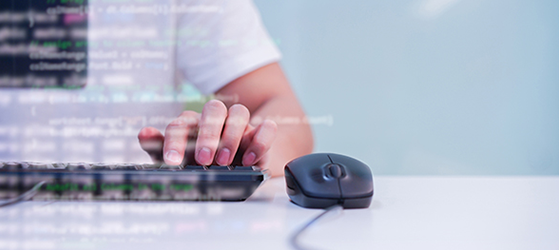 Image of a computer keyboard and mouse with letters and numbers next to it to demonstrate computers are capturing your data.