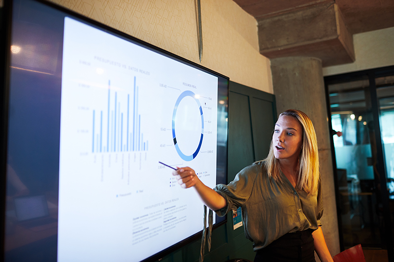 Women presenting data