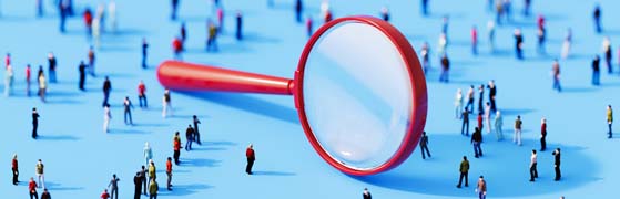 people under a magnifying glass