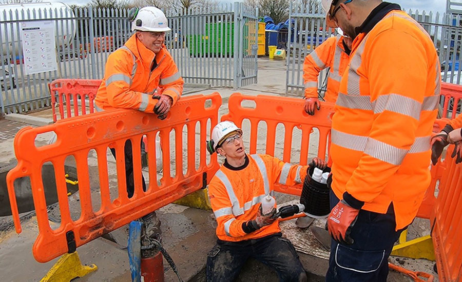Participants wearing high-visibility PPE take part in a sector entry pilot on a live training site, delivered by M Group in partnership with DWP and Energy & Utility Skills