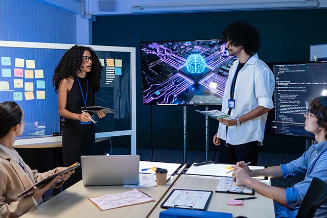 Female project manager sharing AI idea iStock web